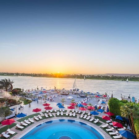 Sonesta St. George Hotel - Convention Center Luxor Esterno foto Sunset at the pool