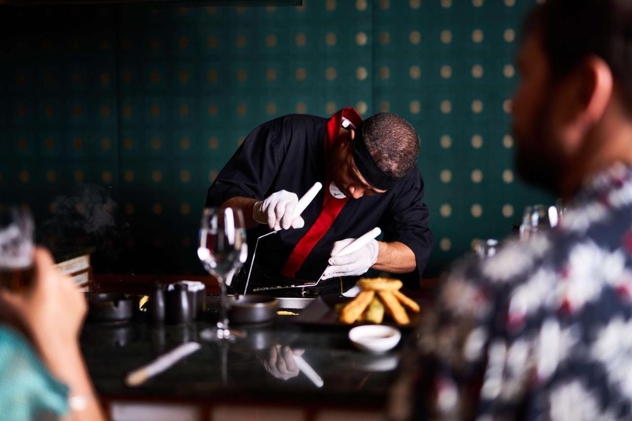 Sonesta St. George Hotel - Convention Center Luxor Esterno foto Chef preparing a meal